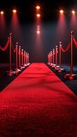 Red carpet leads the way to a glamorous event with bright lights and velvet ropes at night photo