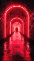 Vivid red neon light illuminates a modern tunnel with arched designs and polished flooring at night photo