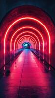 Vibrant neon tunnel with colorful lights reflecting on wet pavement in an urban setting at night photo