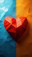 Red origami heart on a textured blue and orange backdrop symbolizes love and creativity in paper art photo