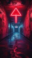 Neon arrow illuminates a dimly lit hallway in a modern urban setting at night photo