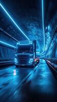 Brightly lit truck traveling through a futuristic tunnel at night photo