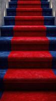 Brightly colored staircase with blue and red carpet leading upwards in a modern interior setting photo