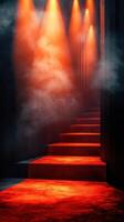 Stairs illuminated by vibrant red lights in a misty environment with a dramatic atmosphere photo