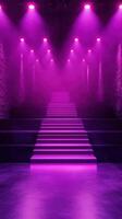 Staircase illuminated by purple lights in a dimly lit venue during an evening event photo