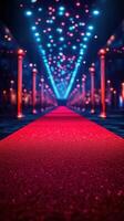Stunning red carpet leading to a glamorous event with colorful lights at night photo