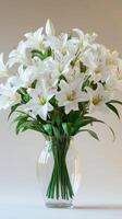 Beautiful white lilies arranged elegantly in a glass vase for a bright home decor accent photo