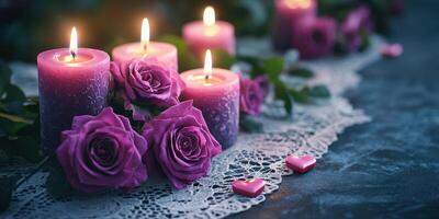 Romantic arrangement of purple candles and roses on lace table setting for a cozy evening photo