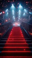 Stunning red carpet staircase illuminated by dazzling lights in an expansive venue photo