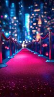 Red carpet leading into a vibrant cityscape, showcasing elegance and excitement at night photo