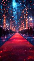 Elegant red carpet path illuminated by sparkling lights at a festive evening event in a city park photo