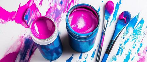 Pink Paint Jars With Blue Brushes photo