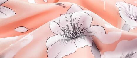 Floral Pattern On Coral Silk Fabric photo