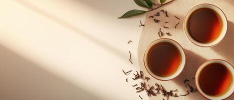 Three Cups Of Black Tea Overhead photo