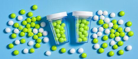 Green And White Pills In Bottles photo