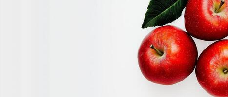 Red Apples With Leaf on White photo