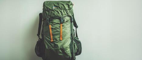 Green Hiking Backpack On White Background photo