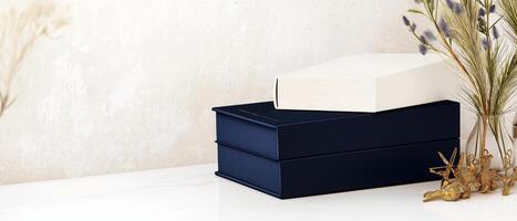 Stacked Gift Boxes With Floral Arrangement photo