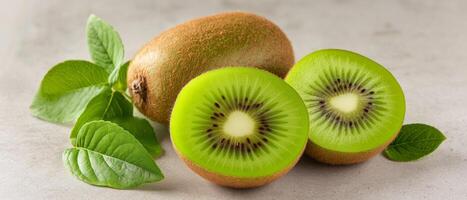 Kiwi Fruit Slices With Leaves photo
