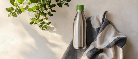 Reusable Water Bottle With Striped Towel photo