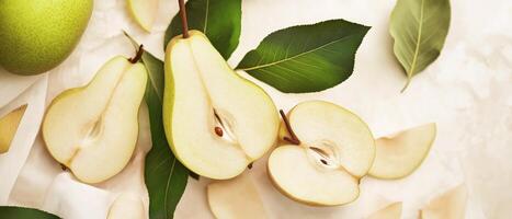 Halved Pears With Leaves On Tablecloth photo