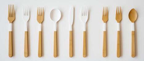 Bamboo Flatware Set on White Background photo
