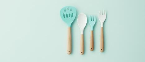 Silicone Kitchen Utensils On Pastel Background photo