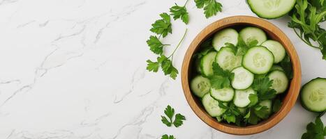 Sliced Cucumbers And Parsley In Bowl photo