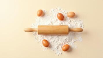 Wooden Rolling Pin With Flour And Eggs photo