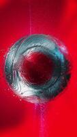 A fantastic illusory sphere of metallic red-gray hue is enveloped in threads of energy waves. video