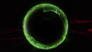 A virtual green ball glows in space, playing with its edges, shimmering with waves of energy. video