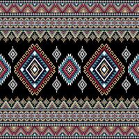 Abstract ethnic geometric texture pattern. Seamless red and yellow color of tribal abstract fabric textile on black background vector