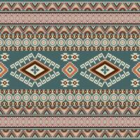Abstract ethnic geometric texture pattern. Seamless yellow and orange color of tribal abstract fabric textile on pastel green background vector