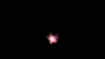 Glowing pink energy burst in the darkness with soft light dispersion effect. Abstract cosmic concept video