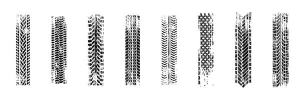 Grunge Tire Track Patterns in Black Set vector