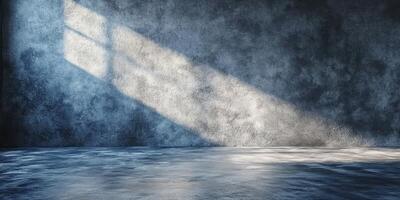 Shadows from a window illuminate a textured wall in a spacious indoor environment photo