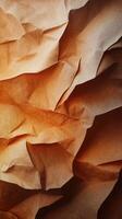 Crumpled paper texture with warm tones creating an abstract visual background photo