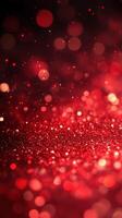 Shimmering red glitter particles create a vibrant, festive background for celebrations and special occasions photo
