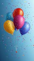 Colorful balloons float against a blue background while confetti rains down in celebration photo