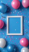 Colorful balloons and decorations surround an empty frame on a vibrant blue background for a celebratory occasion photo