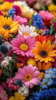 Colorful assortment of summer flowers in a vibrant floral arrangement at a local market photo