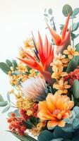 Colorful floral arrangement featuring tropical flowers and foliage in a vibrant display photo