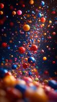 Colorful balls float through the air, creating a vibrant cascade of movement against a dark background photo