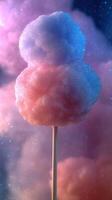Cotton candy stands out against a colorful background of wispy clouds during a festive celebration at night photo