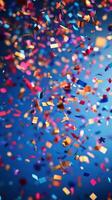 Colorful confetti celebrating a festive event with vibrant hues and joyful atmosphere photo