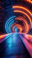 Unique tunnel with illuminated blue and orange lights creating a dynamic visual experience at night photo
