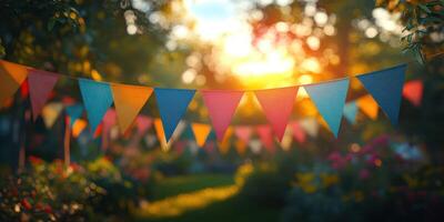 Colorful flags create a festive atmosphere in a sunlit garden during a summer celebration photo