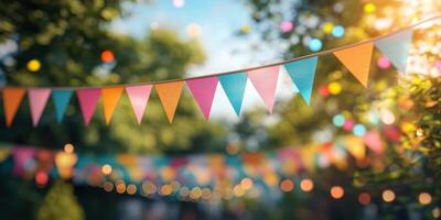 Colorful bunting decorations create a festive atmosphere in an outdoor garden during a summer celebration photo