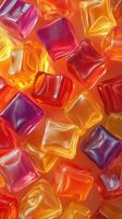 Colorful translucent candies scattered across a vibrant background creating a playful candy landscape photo