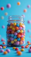 Colorful candy jar filled with assorted sweets on a vibrant blue background photo